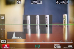 Fuji's unique Digital Split Image - The third battery from the left is in focus, as you can see by the unbroken lines of the battery.  The two batteries on the left appear broken, and thus out of focus.  The split image rectangle can be magnified to fill the viewfinder with the center of the image as well