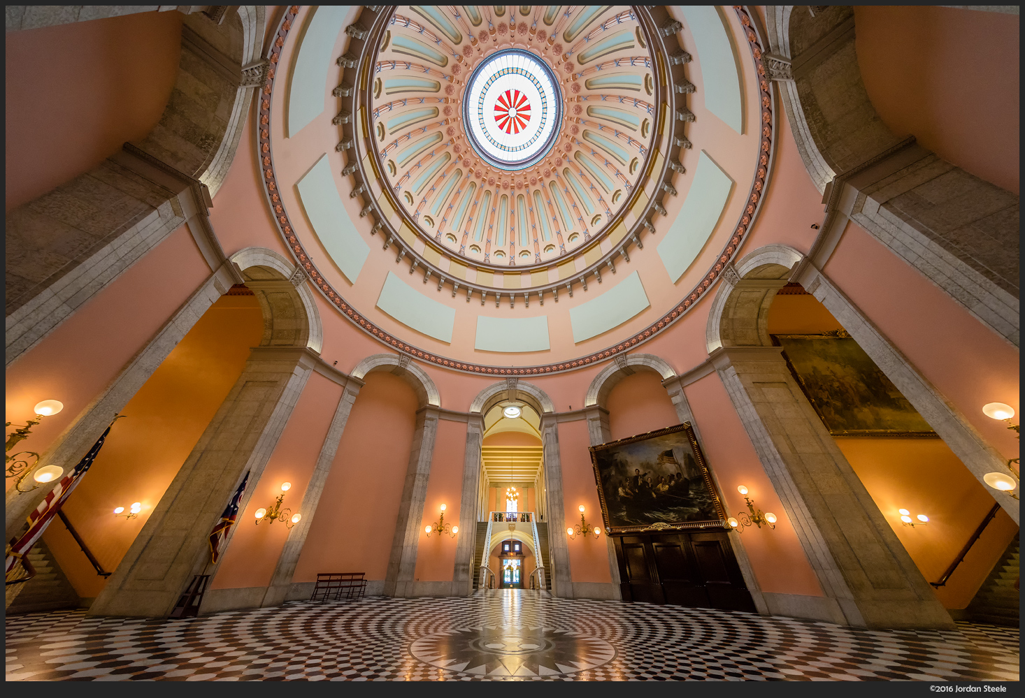 You can incorporate the perspective distortion into the composision, as I did in this shot. Ohio Statehoute rotunda - Sony A7 II with Voigtländer 10mm f/5.6 @ f/8